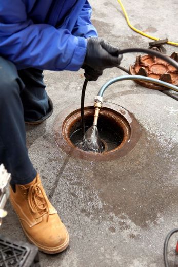 local plumber adelaide using snake and jetting to unblock blocked drain